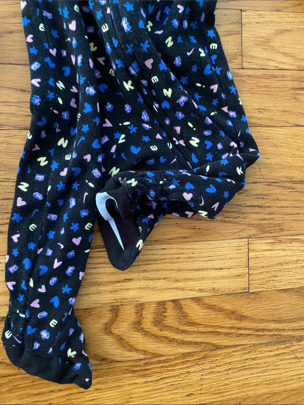 Nike Kids Footed One-Piece Pajamas in Lavender and Black